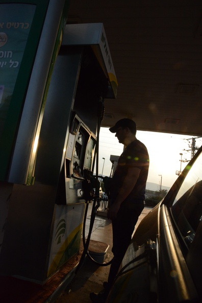 Doug using pay at the pump in Israel.JPG
